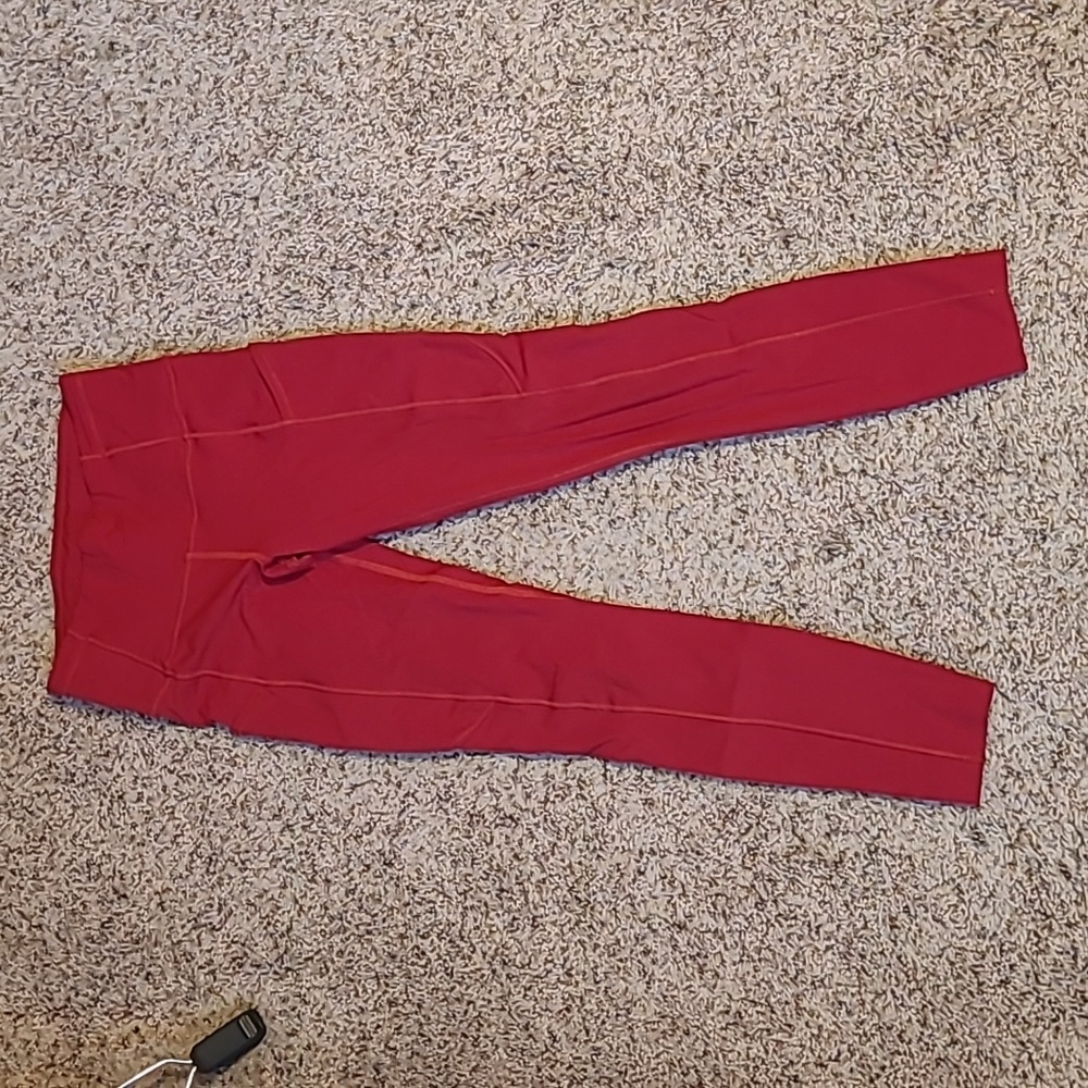 Red Lululemon Fast and Free non-reflective 25" legging, size 4 w/ imperfections
